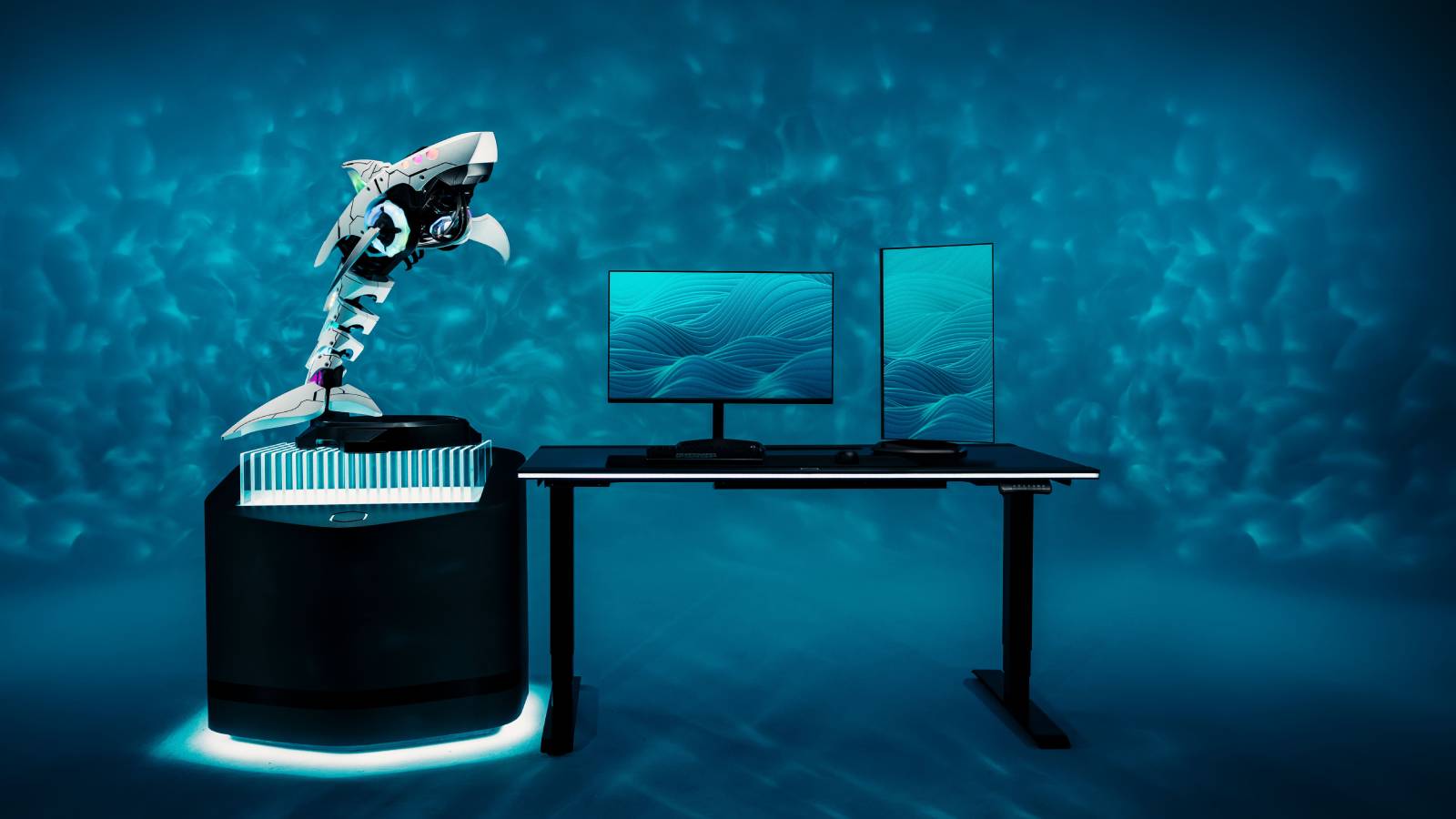 Promotional image of the Shark X PC next to a full-size monitor.