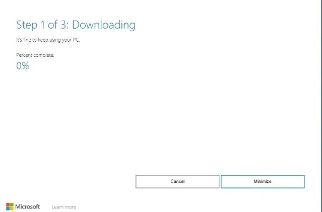 Asystent instalacji systemu Windows 11 pobierający aktualizację 24h2