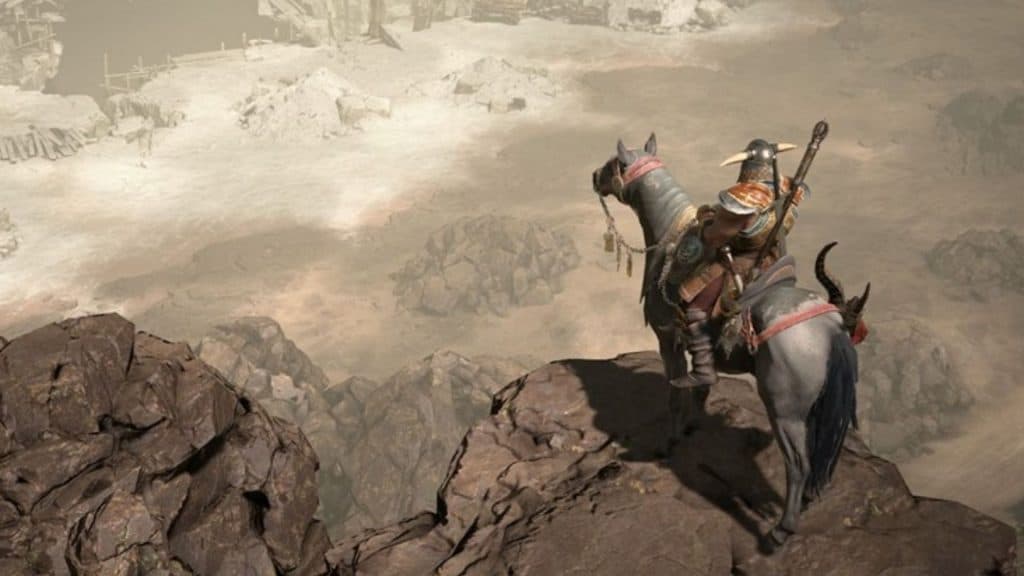 Personaje de Diablo 4 mirando el desierto.