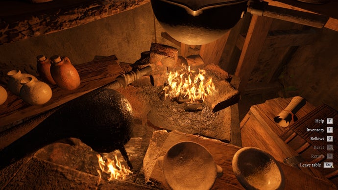 Mały ogień płonący na ławce alchemii w królestwie
